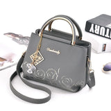 Embossed Floral Shoulder Bag