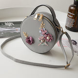 Round Ornate Leather Shoulder Bag